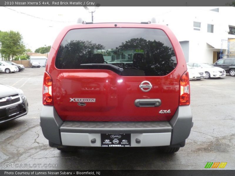 Red Brick Metallic / Gray 2010 Nissan Xterra S 4x4