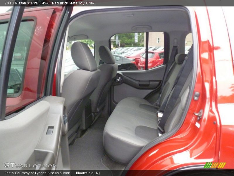Red Brick Metallic / Gray 2010 Nissan Xterra S 4x4
