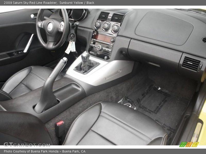 Dashboard of 2009 Sky Red Line Roadster