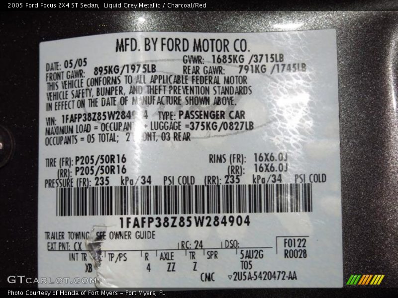 Liquid Grey Metallic / Charcoal/Red 2005 Ford Focus ZX4 ST Sedan