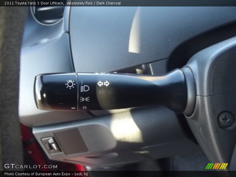 Absolutely Red / Dark Charcoal 2011 Toyota Yaris 3 Door Liftback