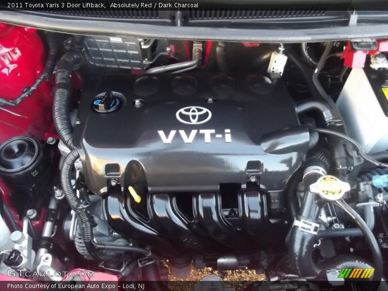 Absolutely Red / Dark Charcoal 2011 Toyota Yaris 3 Door Liftback