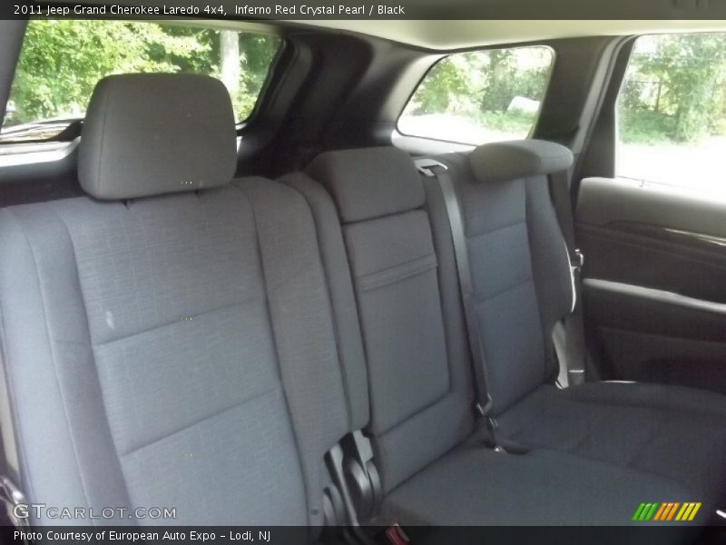 Inferno Red Crystal Pearl / Black 2011 Jeep Grand Cherokee Laredo 4x4