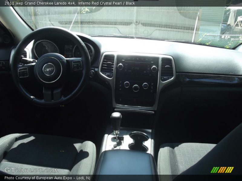 Inferno Red Crystal Pearl / Black 2011 Jeep Grand Cherokee Laredo 4x4