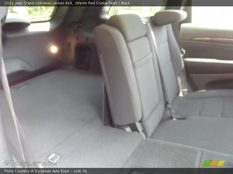 Inferno Red Crystal Pearl / Black 2011 Jeep Grand Cherokee Laredo 4x4