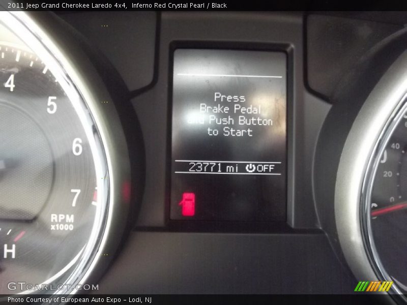Inferno Red Crystal Pearl / Black 2011 Jeep Grand Cherokee Laredo 4x4