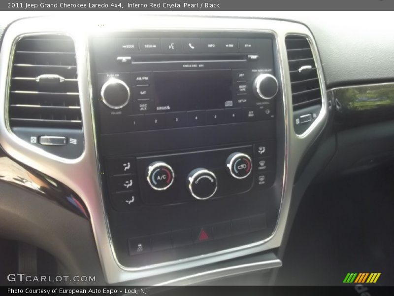 Inferno Red Crystal Pearl / Black 2011 Jeep Grand Cherokee Laredo 4x4