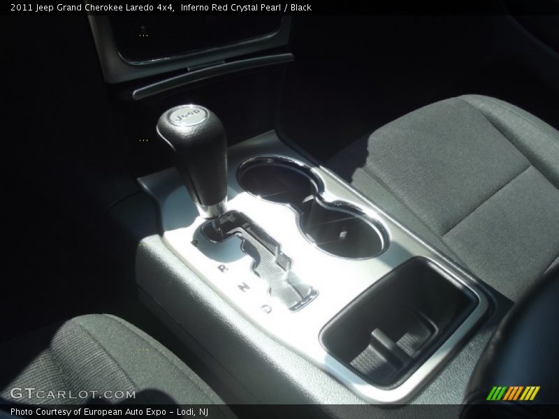 Inferno Red Crystal Pearl / Black 2011 Jeep Grand Cherokee Laredo 4x4