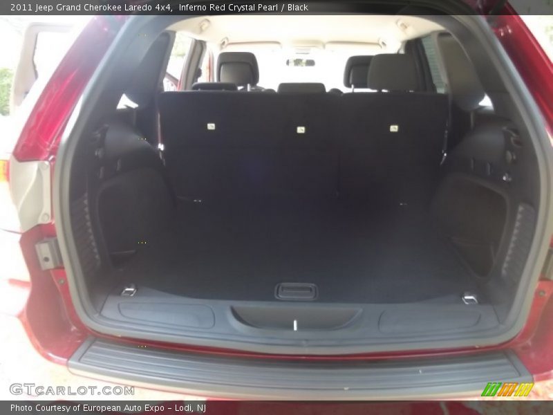 Inferno Red Crystal Pearl / Black 2011 Jeep Grand Cherokee Laredo 4x4