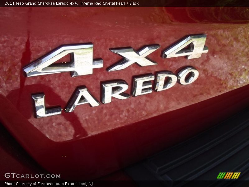 Inferno Red Crystal Pearl / Black 2011 Jeep Grand Cherokee Laredo 4x4