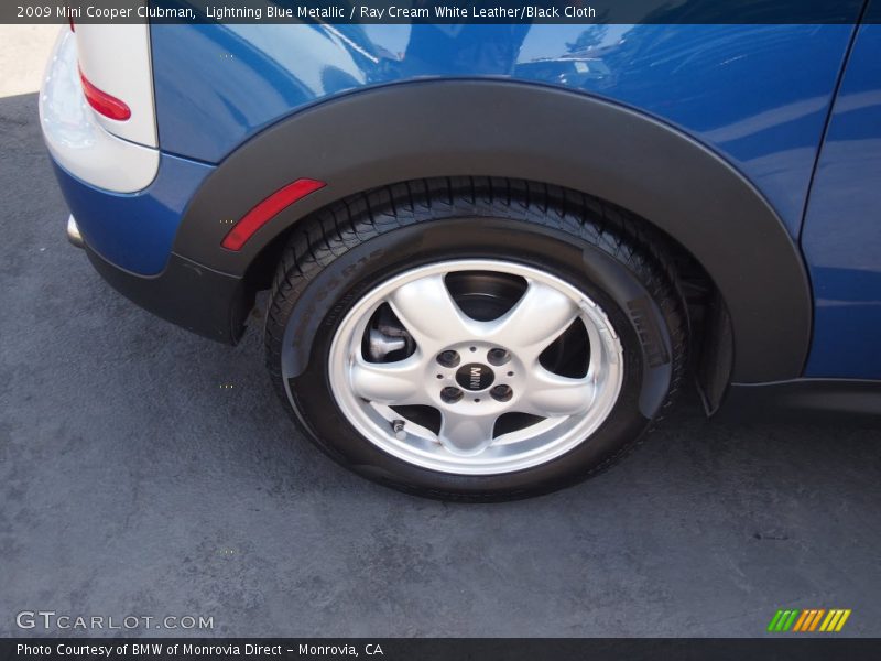 Lightning Blue Metallic / Ray Cream White Leather/Black Cloth 2009 Mini Cooper Clubman