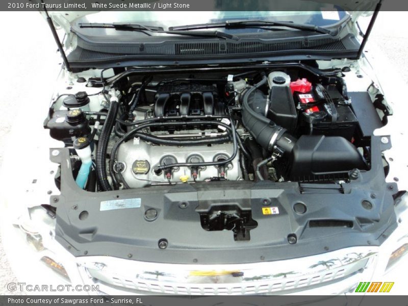 White Suede Metallic / Light Stone 2010 Ford Taurus Limited