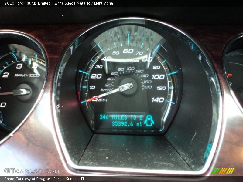White Suede Metallic / Light Stone 2010 Ford Taurus Limited