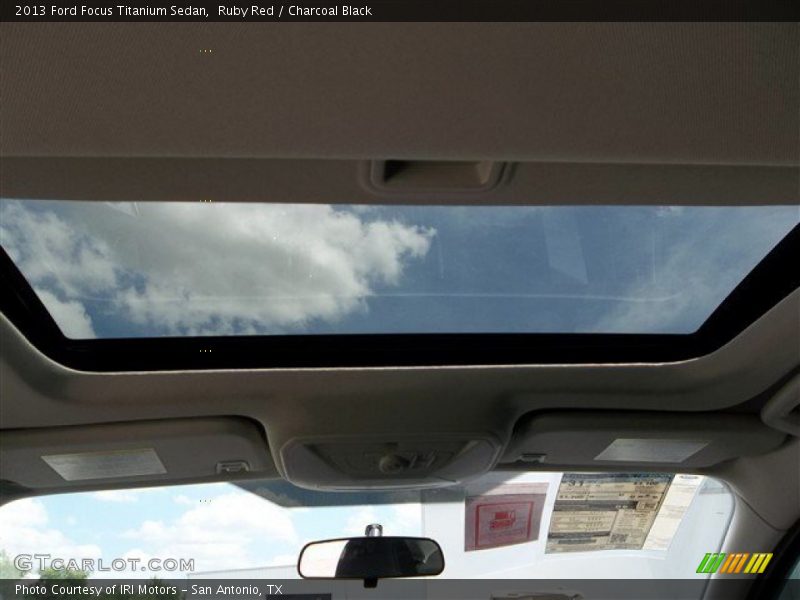 Ruby Red / Charcoal Black 2013 Ford Focus Titanium Sedan