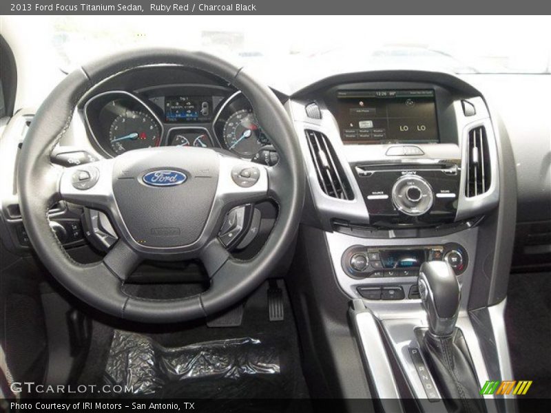 Ruby Red / Charcoal Black 2013 Ford Focus Titanium Sedan
