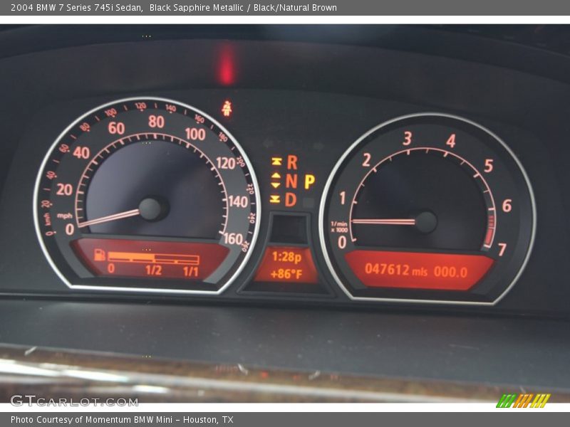 Black Sapphire Metallic / Black/Natural Brown 2004 BMW 7 Series 745i Sedan