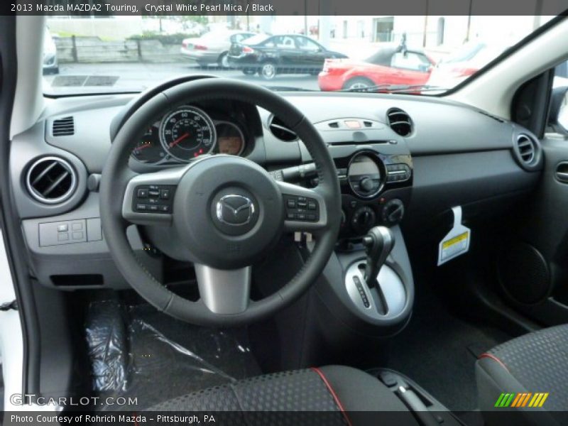 Dashboard of 2013 MAZDA2 Touring