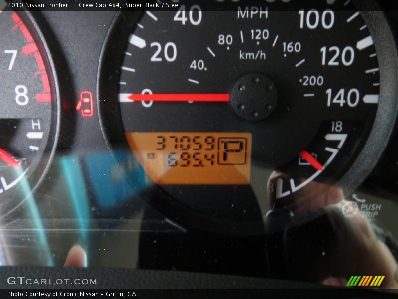 Super Black / Steel 2010 Nissan Frontier LE Crew Cab 4x4