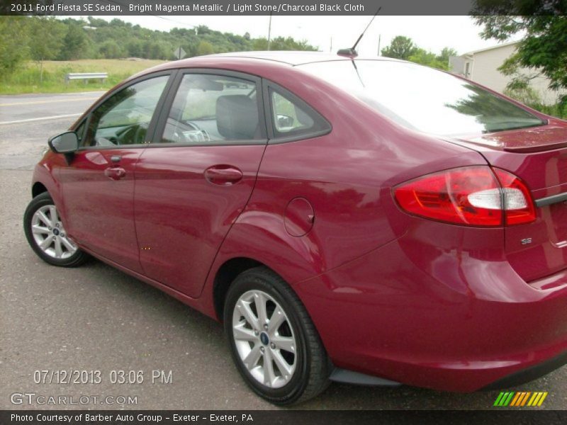 Bright Magenta Metallic / Light Stone/Charcoal Black Cloth 2011 Ford Fiesta SE Sedan