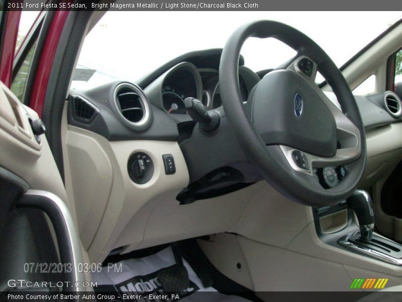 Bright Magenta Metallic / Light Stone/Charcoal Black Cloth 2011 Ford Fiesta SE Sedan