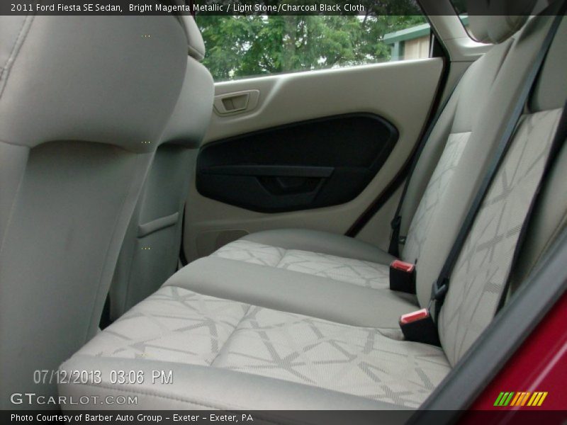 Bright Magenta Metallic / Light Stone/Charcoal Black Cloth 2011 Ford Fiesta SE Sedan