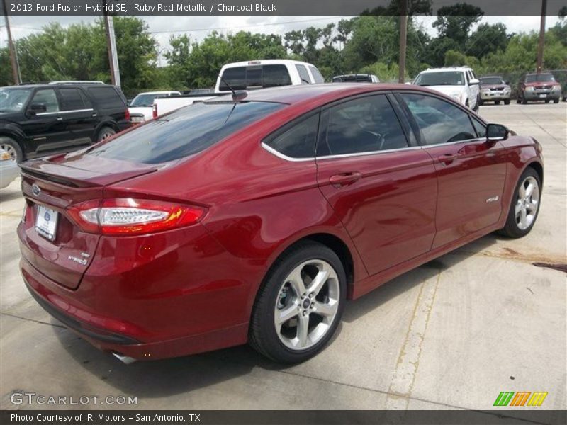 Ruby Red Metallic / Charcoal Black 2013 Ford Fusion Hybrid SE