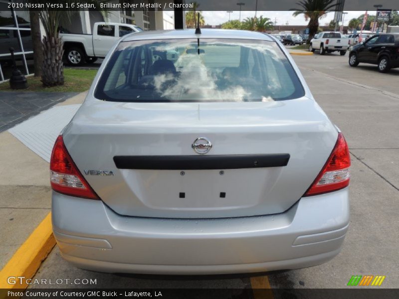 Brilliant Silver Metallic / Charcoal 2010 Nissan Versa 1.6 Sedan