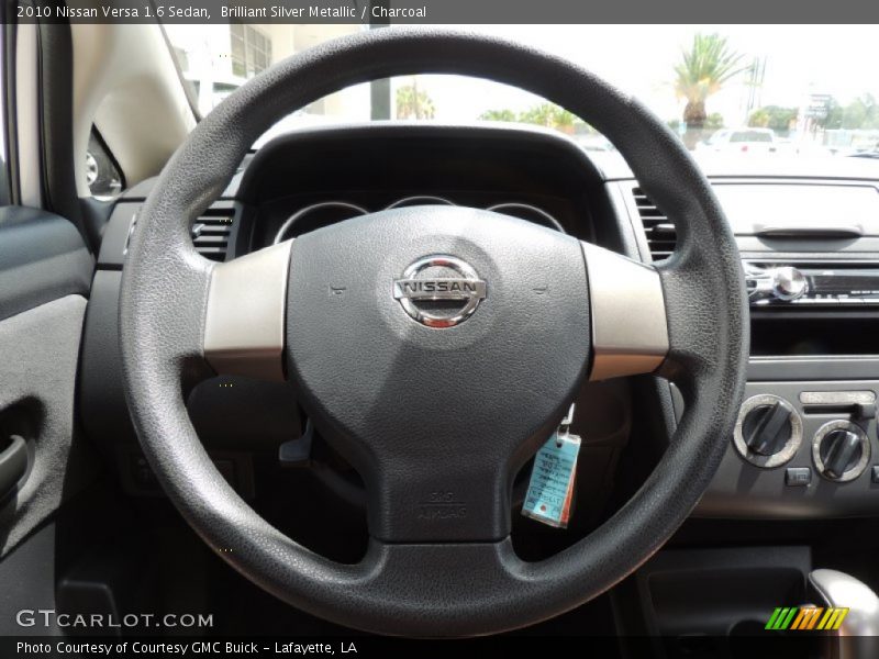 Brilliant Silver Metallic / Charcoal 2010 Nissan Versa 1.6 Sedan