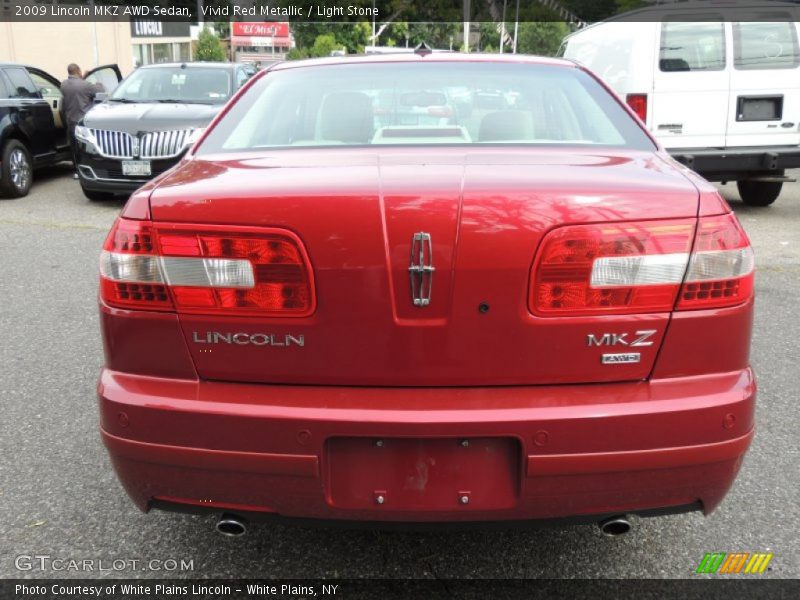 Vivid Red Metallic / Light Stone 2009 Lincoln MKZ AWD Sedan