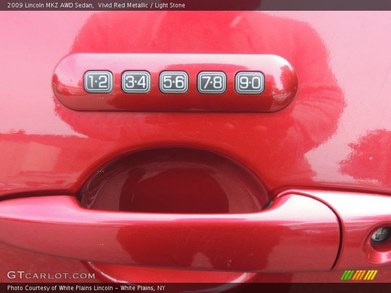 Vivid Red Metallic / Light Stone 2009 Lincoln MKZ AWD Sedan