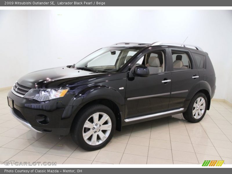 Labrador Black Pearl / Beige 2009 Mitsubishi Outlander SE