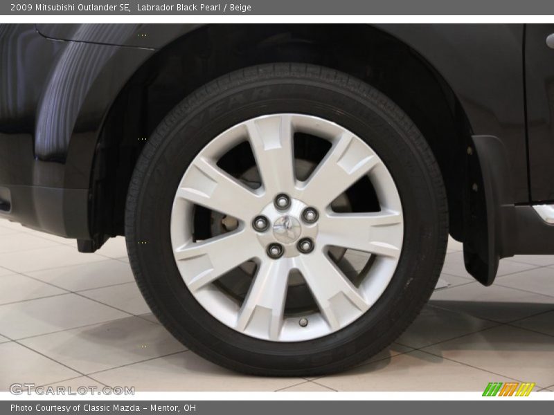 Labrador Black Pearl / Beige 2009 Mitsubishi Outlander SE