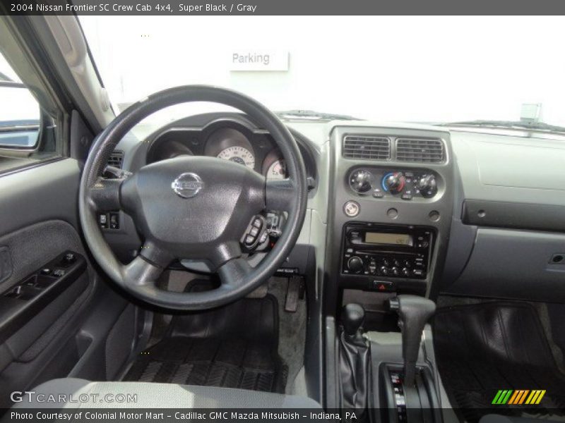 Dashboard of 2004 Frontier SC Crew Cab 4x4