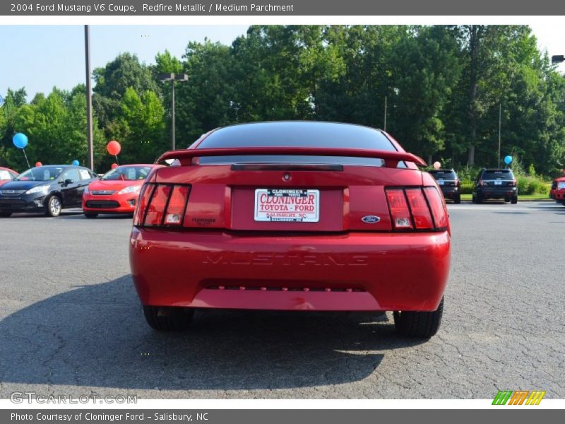 Redfire Metallic / Medium Parchment 2004 Ford Mustang V6 Coupe