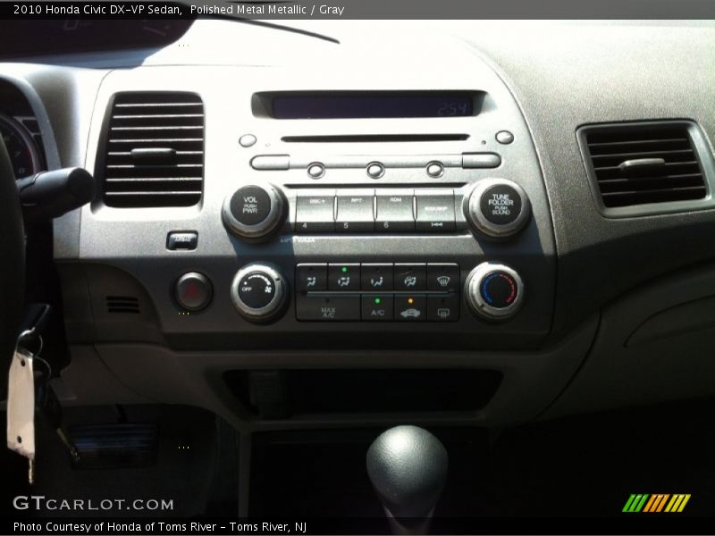 Polished Metal Metallic / Gray 2010 Honda Civic DX-VP Sedan