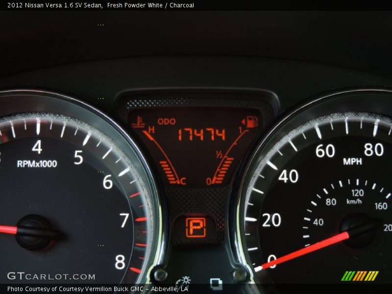 Fresh Powder White / Charcoal 2012 Nissan Versa 1.6 SV Sedan
