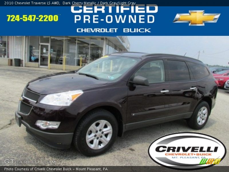 Dark Cherry Metallic / Dark Gray/Light Gray 2010 Chevrolet Traverse LS AWD