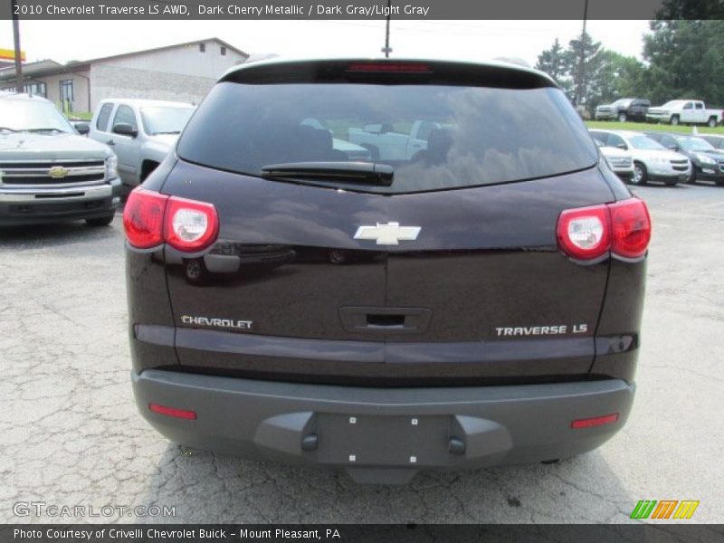 Dark Cherry Metallic / Dark Gray/Light Gray 2010 Chevrolet Traverse LS AWD