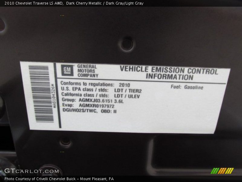 Dark Cherry Metallic / Dark Gray/Light Gray 2010 Chevrolet Traverse LS AWD