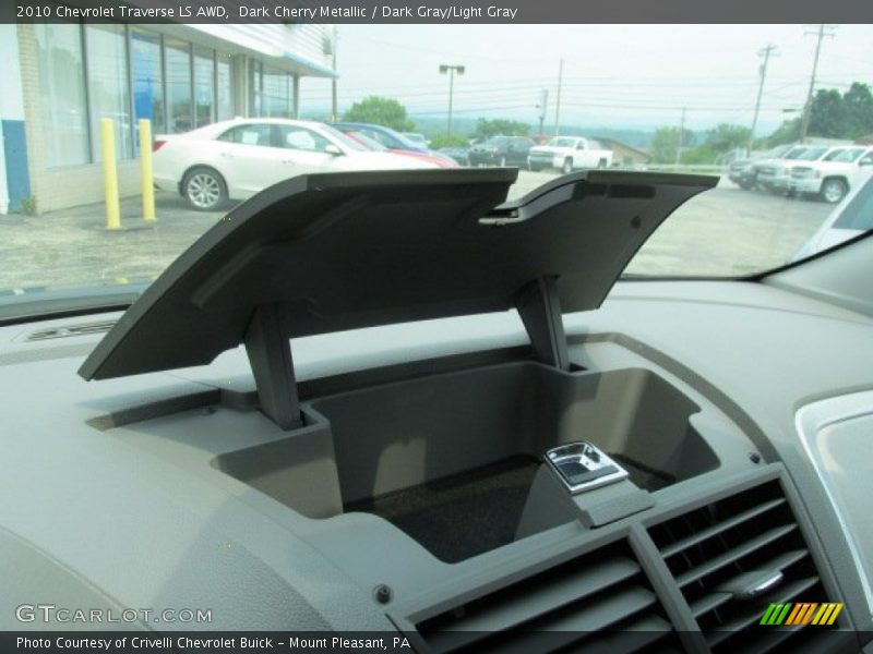 Dark Cherry Metallic / Dark Gray/Light Gray 2010 Chevrolet Traverse LS AWD
