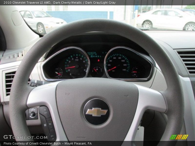 Dark Cherry Metallic / Dark Gray/Light Gray 2010 Chevrolet Traverse LS AWD