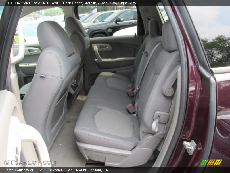 Dark Cherry Metallic / Dark Gray/Light Gray 2010 Chevrolet Traverse LS AWD