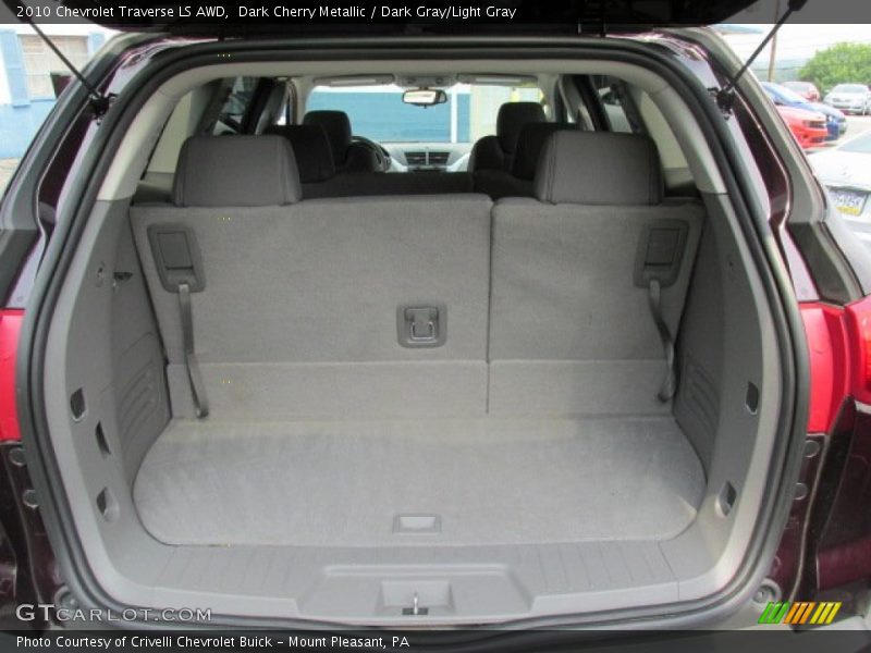 Dark Cherry Metallic / Dark Gray/Light Gray 2010 Chevrolet Traverse LS AWD