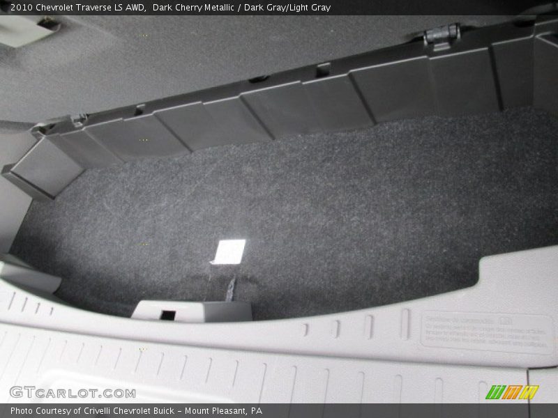 Dark Cherry Metallic / Dark Gray/Light Gray 2010 Chevrolet Traverse LS AWD