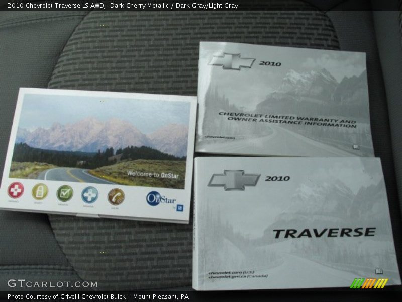 Dark Cherry Metallic / Dark Gray/Light Gray 2010 Chevrolet Traverse LS AWD
