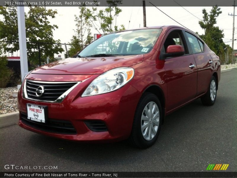 Red Brick / Charcoal 2012 Nissan Versa 1.6 SV Sedan