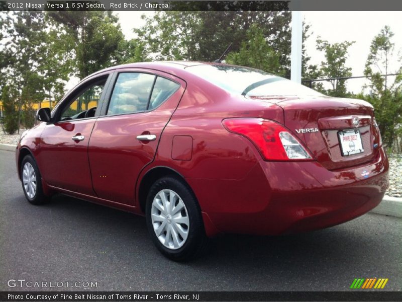 Red Brick / Charcoal 2012 Nissan Versa 1.6 SV Sedan