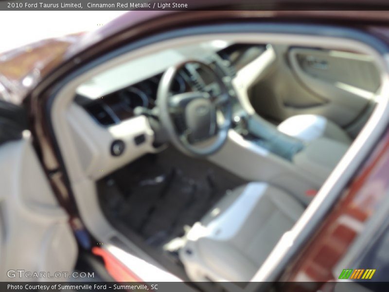 Cinnamon Red Metallic / Light Stone 2010 Ford Taurus Limited