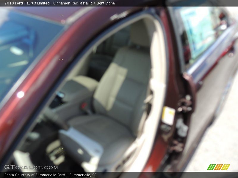 Cinnamon Red Metallic / Light Stone 2010 Ford Taurus Limited
