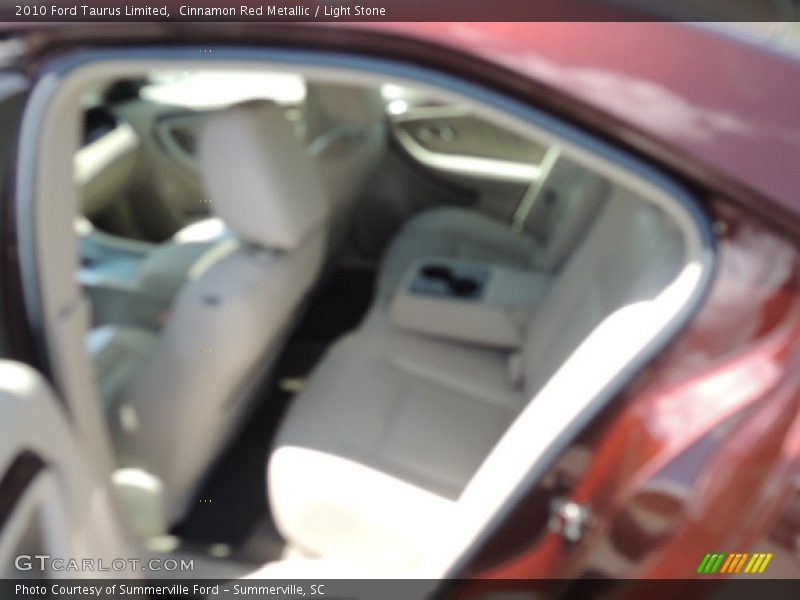 Cinnamon Red Metallic / Light Stone 2010 Ford Taurus Limited